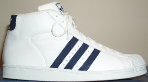 The adidas Promodel high-top basketball shoe: white with dark blue stripes