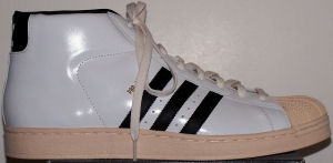 adidas Promodel Original high-top basketball shoe (white patent leather, black stripe and trims, beige outsole)