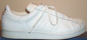 adidas Superstar basketball shoe, white leather with white stripes and trim