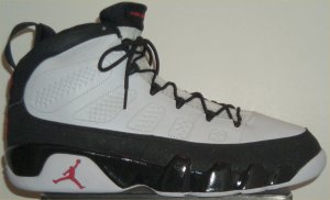 Air Jordan 9 basketball shoe in white with black trim and red JUMPMAN (Chicago Bulls colorway)
