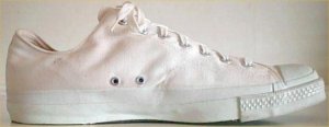 White low-top vintage PF sneakers made for a United States Army contract (now Army surplus)