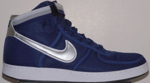Nike Vandal high-top shoe: blue with gray and gold ankle strap and glossy silver and white SWOOSH