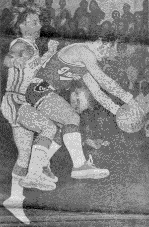 Baby Boomers playing hot and heavy competitive basketball in Chucks Baby Boomers playing hot and heavy competitive basketball in Chucks