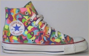 Converse "Chuck Taylor" All-Star high-top with an upper custom-made by hand; white foxing at the bottom with red and blue stripes Converse "Chuck Taylor" All-Star high-top with an upper custom-made by hand; white foxing at the bottom with red and blue stripes