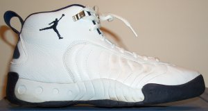 The Nike Jumpman Pro basketball sneaker, white with dark blue trim