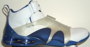 Nike Shox Stunner athletic shoe, white with blue trim and translucent spat strap Nike Shox Stunner athletic shoe, white with blue trim and translucent spat strap